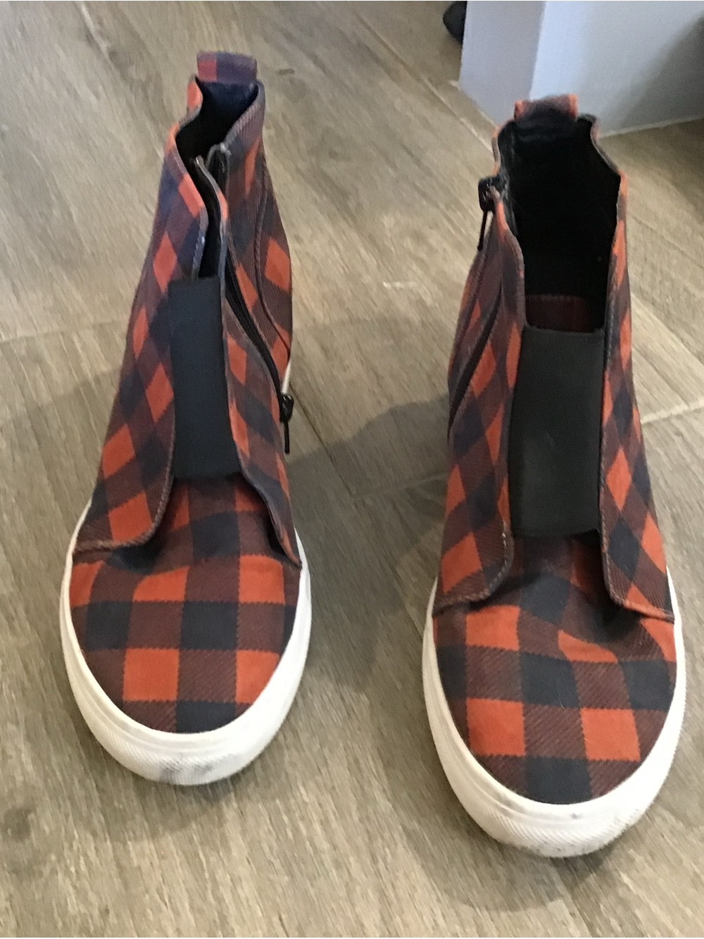 Crazy Train High-Top Slip-On Sneakers in Orange & Black Plaid